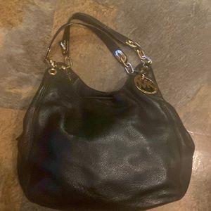 Michael Michael know black handbag.